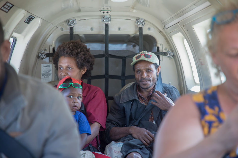 Papua New Guinea family in airplane